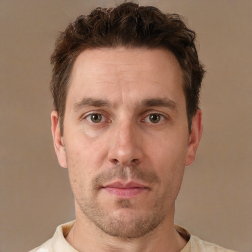 Neutral white adult male with short  brown hair and brown eyes