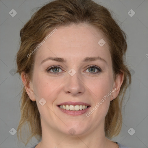 Joyful white young-adult female with medium  brown hair and blue eyes