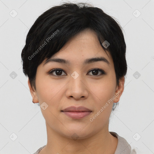 Joyful asian young-adult female with short  black hair and brown eyes