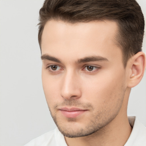 Neutral white young-adult male with short  brown hair and brown eyes