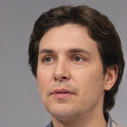 Neutral white adult male with short  brown hair and brown eyes