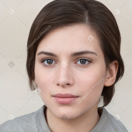 Neutral white young-adult female with medium  brown hair and brown eyes