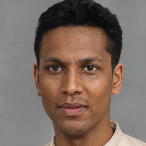 Neutral black young-adult male with short  black hair and brown eyes