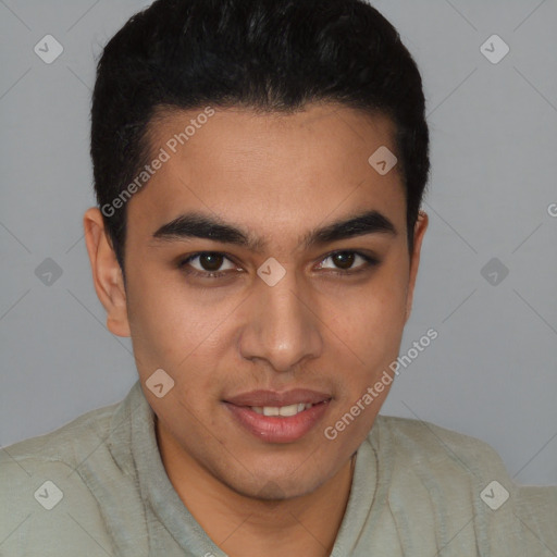 Joyful latino young-adult male with short  black hair and brown eyes