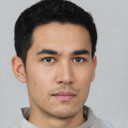 Neutral asian young-adult male with short  black hair and brown eyes