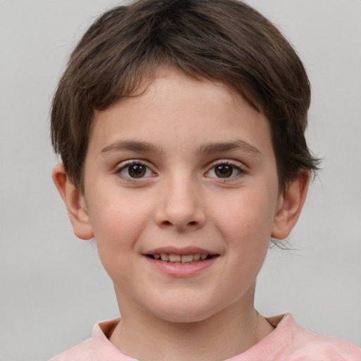 Joyful white child female with short  brown hair and brown eyes