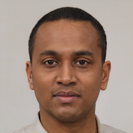 Neutral black young-adult male with short  black hair and brown eyes