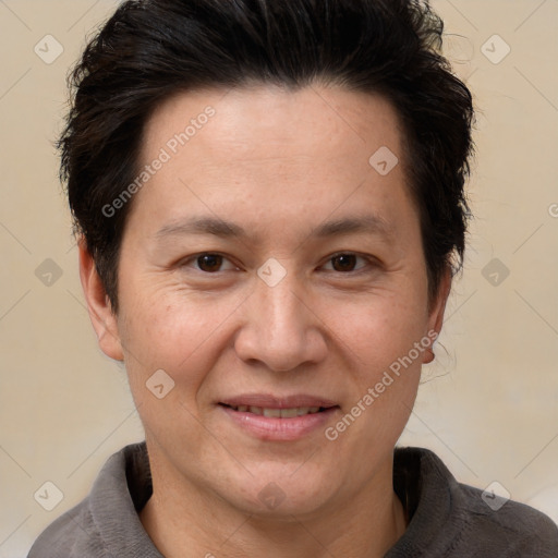 Joyful white adult female with short  brown hair and brown eyes