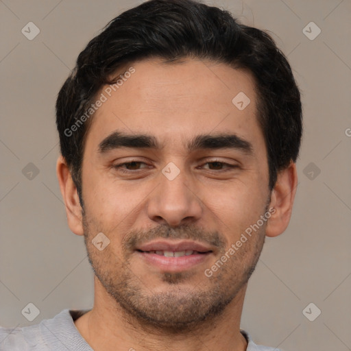 Joyful white young-adult male with short  black hair and brown eyes