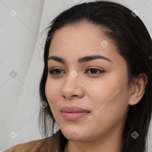 Joyful asian young-adult female with long  brown hair and brown eyes