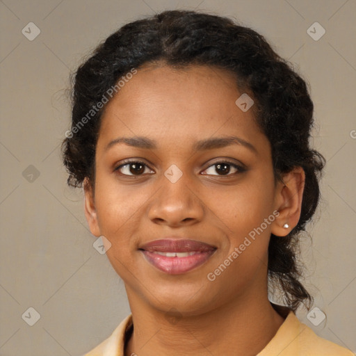 Joyful black young-adult female with medium  black hair and brown eyes