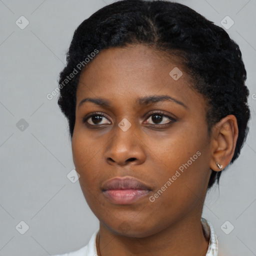 Neutral black young-adult female with short  black hair and brown eyes