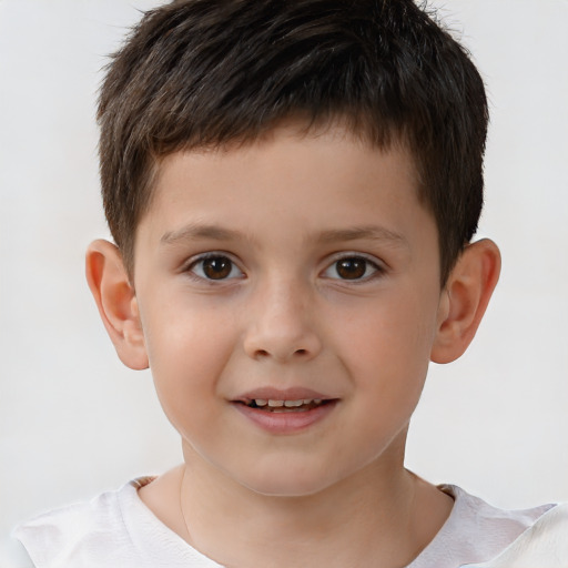 Joyful white child male with short  brown hair and brown eyes