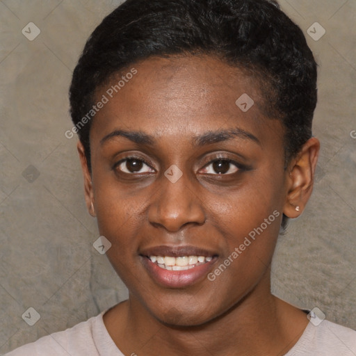 Joyful black young-adult female with short  brown hair and brown eyes