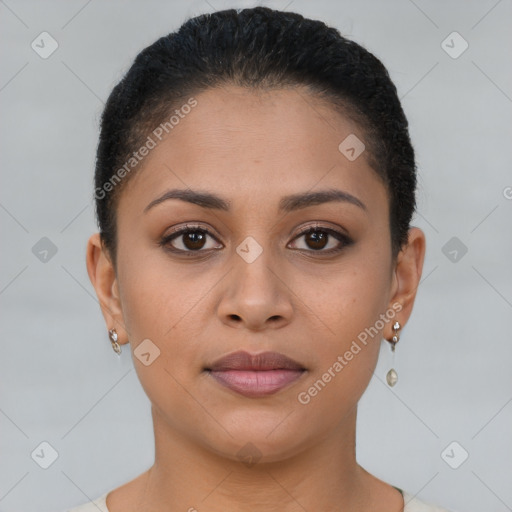 Joyful latino young-adult female with short  brown hair and brown eyes
