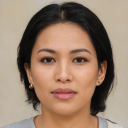 Neutral asian young-adult female with medium  black hair and brown eyes