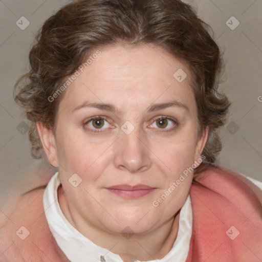 Joyful white adult female with medium  brown hair and blue eyes