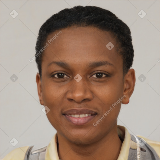 Joyful black young-adult female with short  black hair and brown eyes