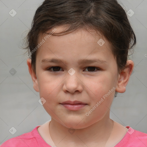 Joyful white child female with short  brown hair and brown eyes