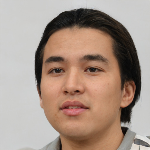 Neutral asian young-adult male with medium  black hair and brown eyes