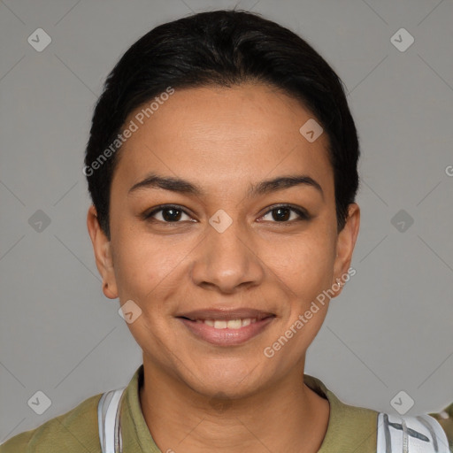 Joyful latino young-adult female with short  black hair and brown eyes