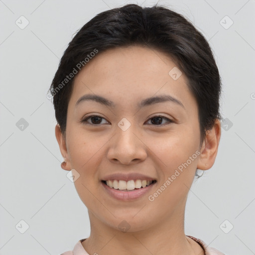 Joyful asian young-adult female with short  brown hair and brown eyes