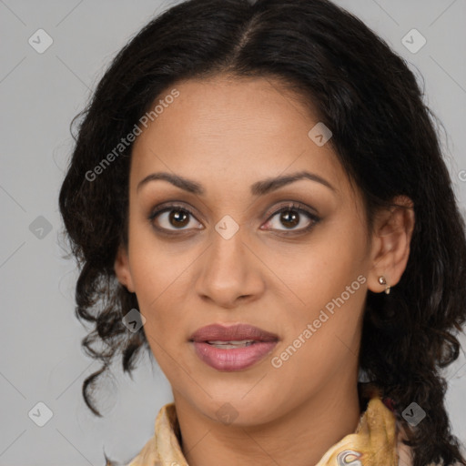 Joyful latino young-adult female with long  brown hair and brown eyes