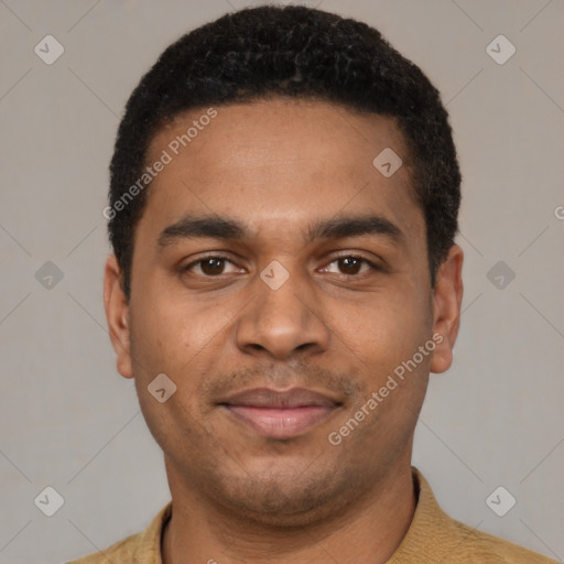 Joyful black young-adult male with short  black hair and brown eyes