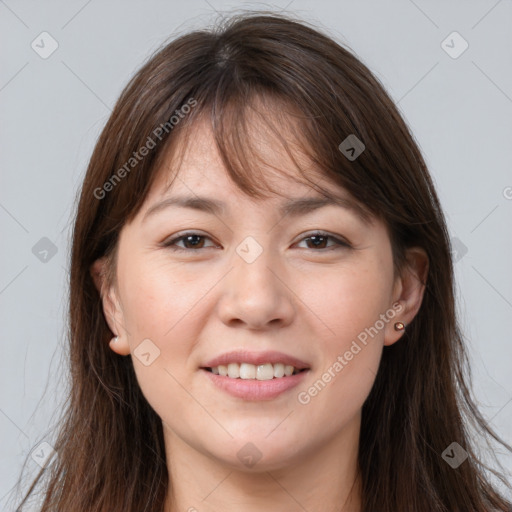 Joyful white young-adult female with long  brown hair and brown eyes