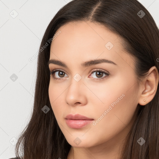 Neutral white young-adult female with long  brown hair and brown eyes