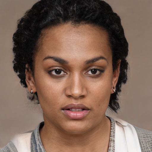 Neutral latino young-adult female with short  black hair and brown eyes