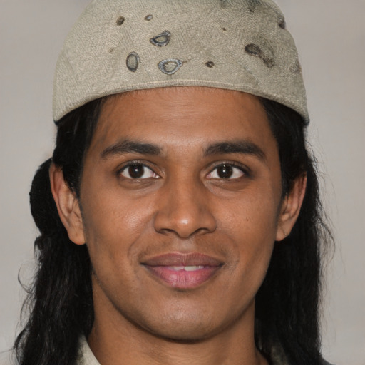 Joyful asian young-adult male with medium  black hair and brown eyes