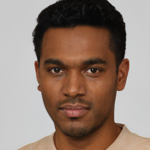 Neutral black young-adult male with short  black hair and brown eyes