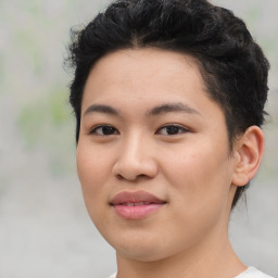 Joyful asian young-adult female with short  black hair and brown eyes