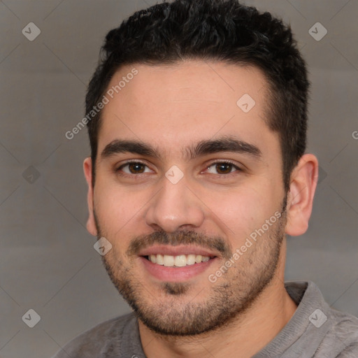 Joyful white young-adult male with short  black hair and brown eyes