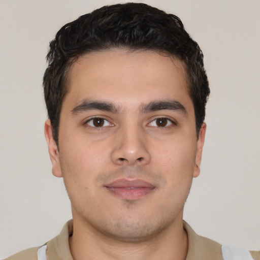 Neutral latino young-adult male with short  brown hair and brown eyes