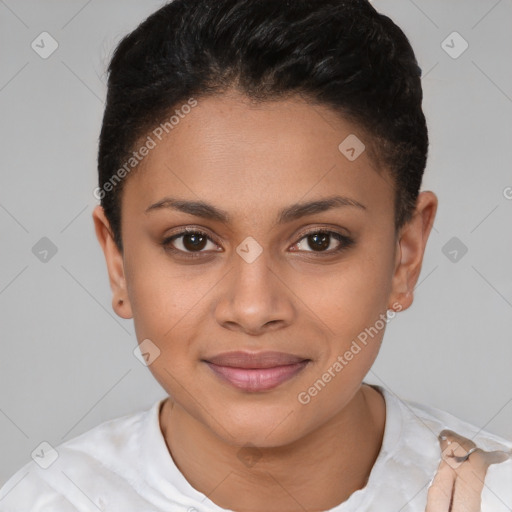 Joyful black young-adult female with short  brown hair and brown eyes