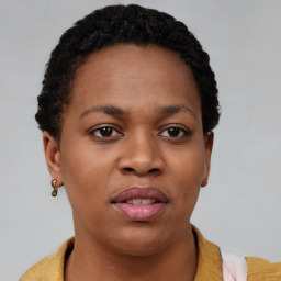 Neutral black young-adult female with short  brown hair and brown eyes