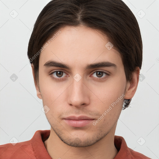 Neutral white young-adult male with short  brown hair and brown eyes