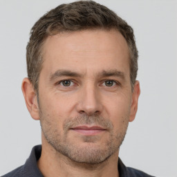 Neutral white adult male with short  brown hair and brown eyes