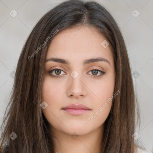 Neutral white young-adult female with long  brown hair and brown eyes