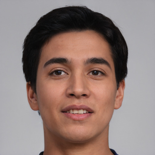 Joyful asian young-adult male with short  black hair and brown eyes