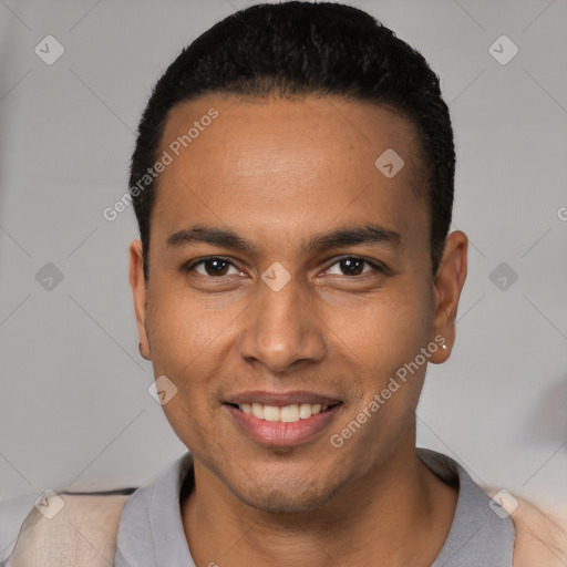 Joyful white young-adult male with short  black hair and brown eyes