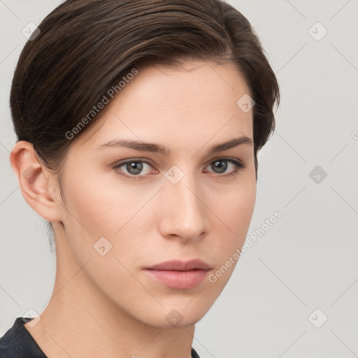 Neutral white young-adult female with medium  brown hair and grey eyes