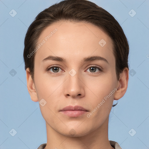 Neutral white young-adult female with short  brown hair and brown eyes