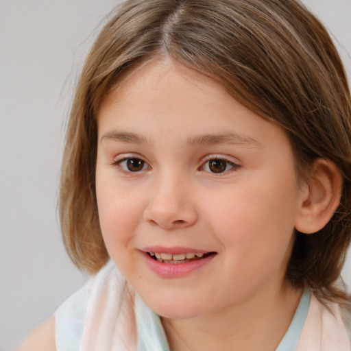 Joyful white child female with medium  brown hair and brown eyes