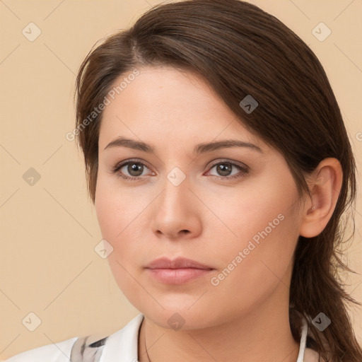 Neutral white young-adult female with medium  brown hair and brown eyes