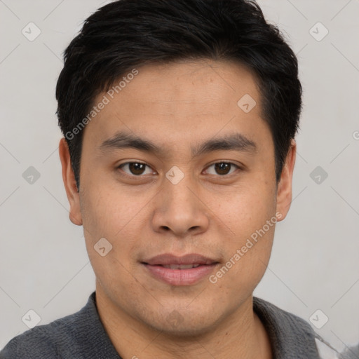 Joyful latino young-adult male with short  black hair and brown eyes