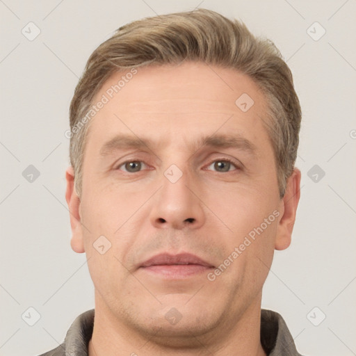 Neutral white adult male with short  brown hair and brown eyes