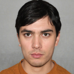 Neutral white young-adult male with short  black hair and brown eyes